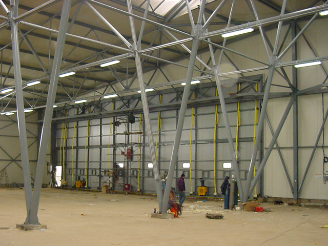 Inside view of closed bifold door on European hangar