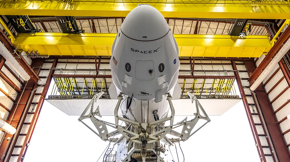 Closeup of SpaceX rocket traveling through Schweiss bifold hangar door while entering storage hangar Closeup of SpaceX rocket traveling through Schweiss bifold hangar door while entering storage hangar