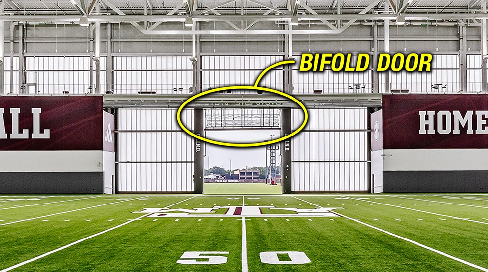 Closeup of Schweiss bifold door installed on Texas A&M University Football Performance Center Closeup of Schweiss bifold door installed on Texas A&M University Football Performance Center