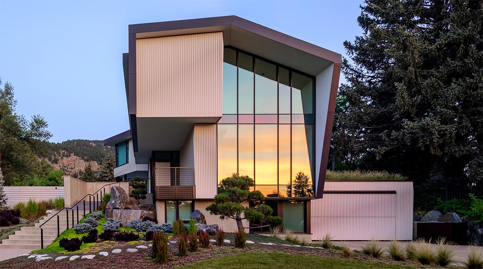 Schweiss bifold fold up door used as garage door on luxurious home in Denver, Colorado Schweiss bifold fold up door used as garage door on luxurious home in Denver, Colorado