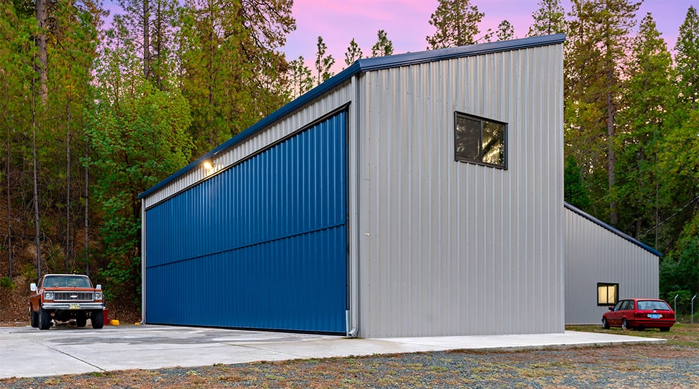 Schweiss bifold door installed on automotive garage in Nevada City shown open Schweiss bifold door installed on automotive garage in Nevada City shown open