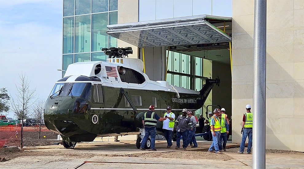 Historic American helicopter, Marine One, passing through Schweiss bifold door installed George H.W. Bush Presidential Library and Museum on its final journey Historic American helicopter, Marine One, passing through Schweiss bifold door installed George H.W. Bush Presidential Library and Museum on its final journey