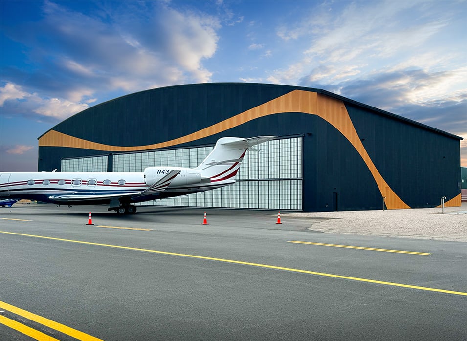 Exterior view of the 120ft Schweiss hydraulic door on a hangar shown closed