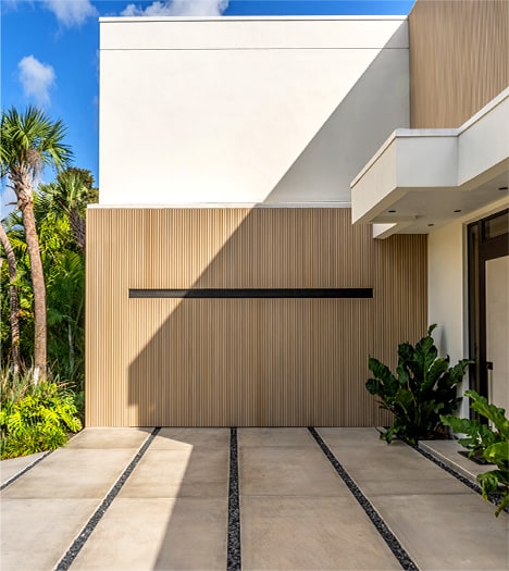 Hidden Schweiss hydraulic designer door installed on Barake designer home shown closed Hidden Schweiss hydraulic designer door installed on Barake designer home shown closed