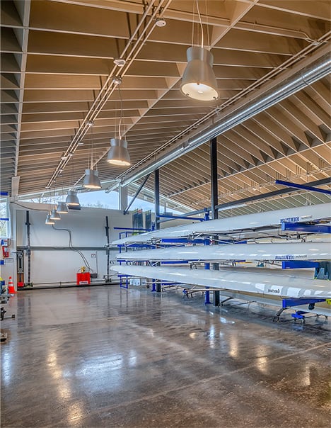 Interior view of the Hamilton College Boathouse with Schweiss bifold door shown closed
