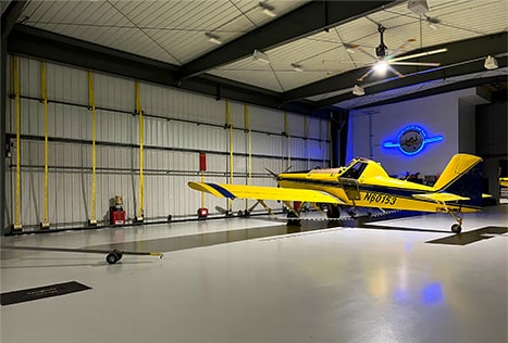 Interior view of Nebraskaland Hangar, showing one plane parked inside Interior view of Nebraskaland Hangar, showing one plane parked inside