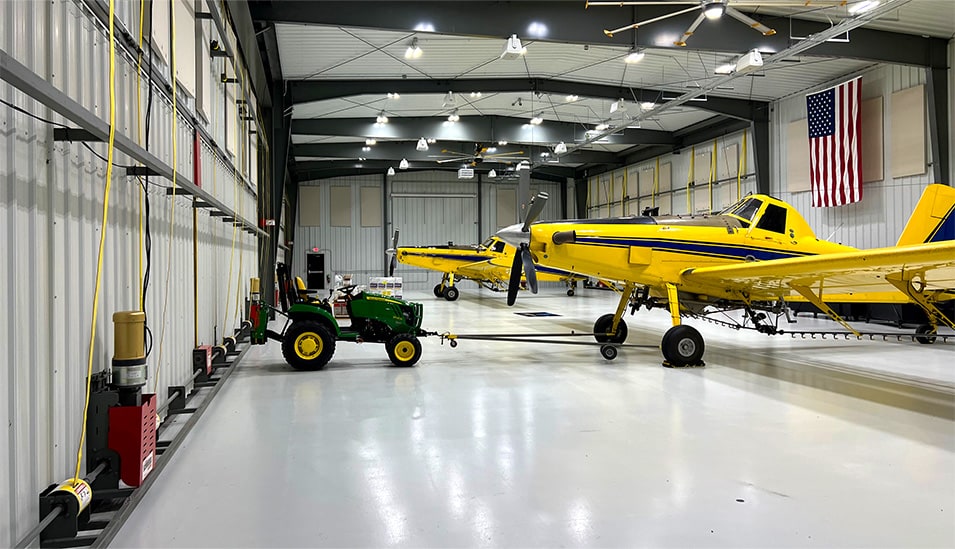 Interior view of Nebraskaland Hangar, showing two planes parked inside Interior view of Nebraskaland Hangar, showing two planes parked inside