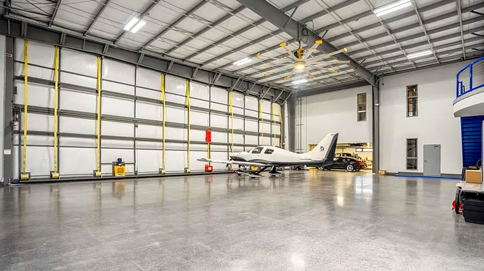 Interior view of Schweiss bifold door installed on a hangar home in Houston shown closed Interior view of Schweiss bifold door installed on a hangar home in Houston shown closed