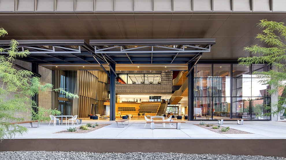 Multiple Schweiss hydraulic glass doors installed on University of AZ Health Sciences building shown open Multiple Schweiss hydraulic glass doors installed on University of AZ Health Sciences building shown open