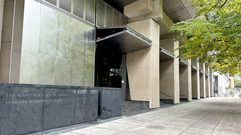 Seven Schweiss bifold security doors installed on Mark O Hatfield US Courthouse to help protect it from future vandalism  Seven Schweiss bifold security doors installed on Mark O Hatfield US Courthouse to help protect it from future vandalism