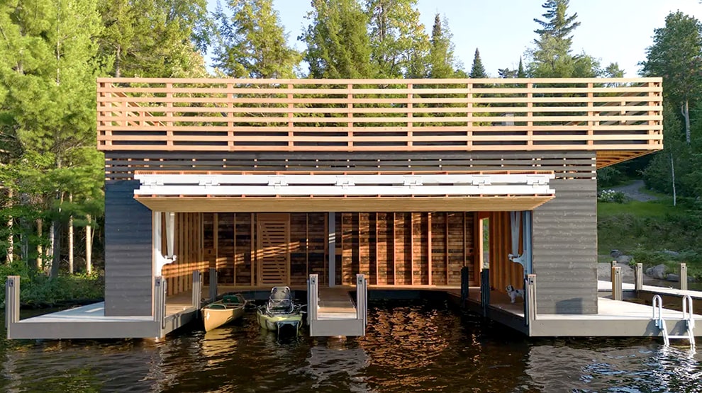 Schweiss bifold boathouse installed on rainbow Lake Boathouse shown open Schweiss bifold boathouse installed on rainbow Lake Boathouse shown open
