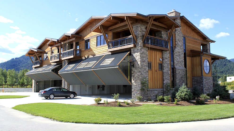 Schweiss bifold hangar home doors installed on multiple hangar homes at Silverwing Airpark Schweiss bifold hangar home doors installed on multiple hangar homes at Silverwing Airpark