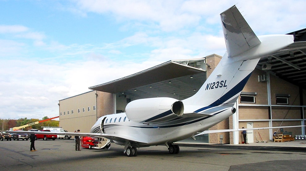 Cessna Citation X parked in front of hangar fitted with Schweiss bifold door Cessna Citation X parked in front of hangar fitted with Schweiss bifold door