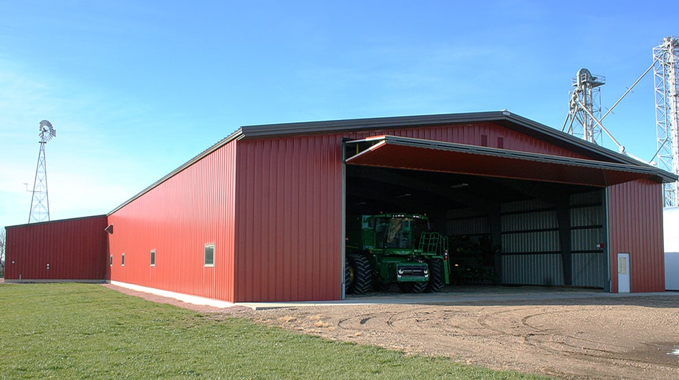 Schweiss bifold ag door installed on farmers shop in New Ulm MN Schweiss bifold ag door installed on farmers shop in New Ulm MN