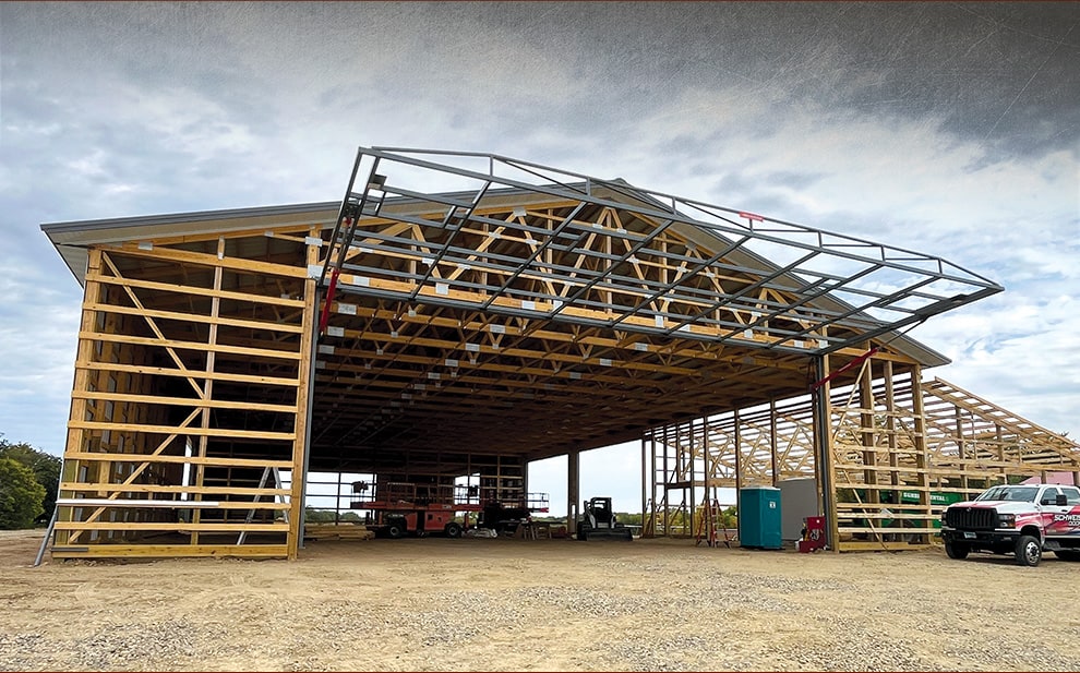 Frame of Arizona hydraulic door by Schweiss shown fitted and operational on new construction