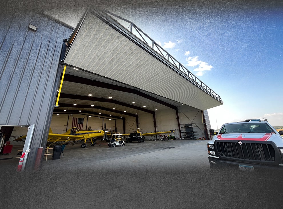 Missouri hydraulic door by Schweiss being installed on a new building