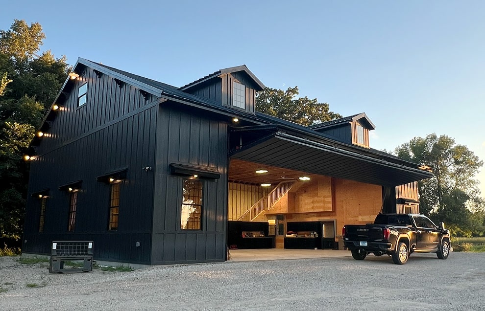 Montana bifold door by Schweiss installed on building shown open