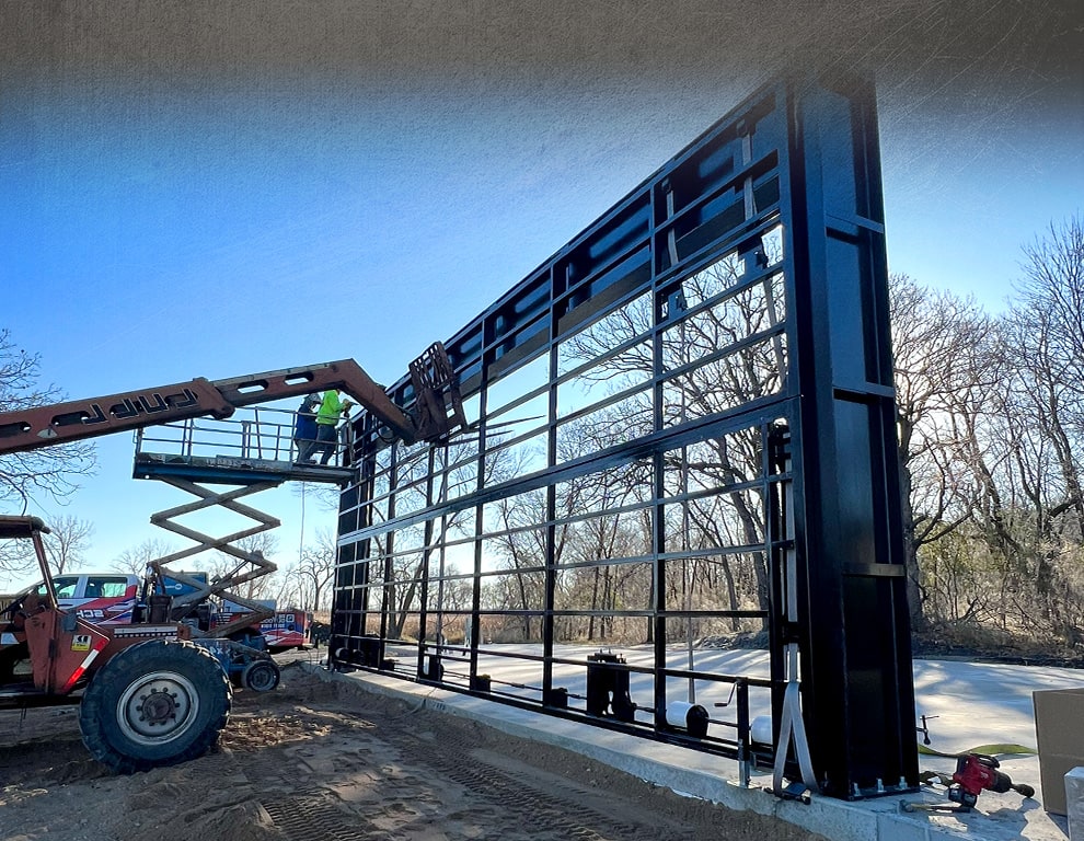 Ohio bifold frame by Schweiss in process of being installed